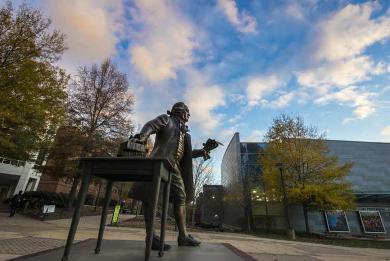 George Mason Statue with a blue cloudy sky in background