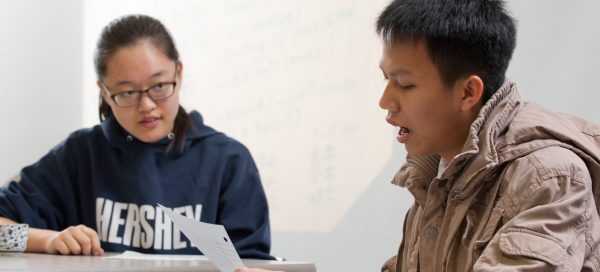 Students of Professor Xu Wang participate in a language exercise in an Elementary Chinese class at Enterprise Hall at Mason's Fairfax Campus.